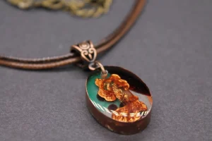 colgante ovalado ambar